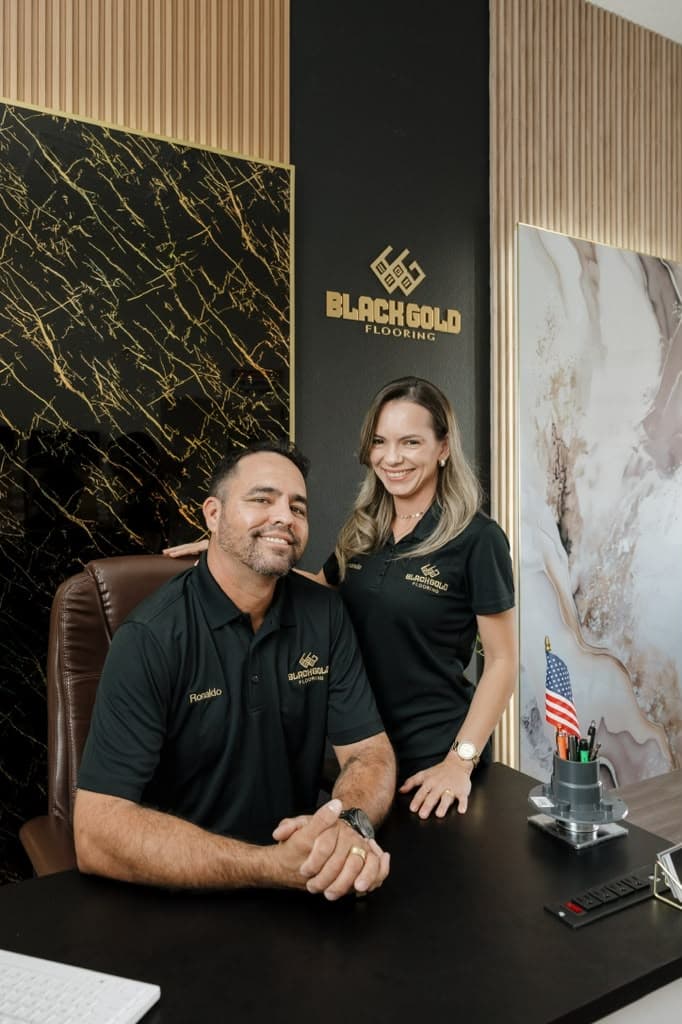 Ronaldo and Ana Silva at Black Gold Flooring office